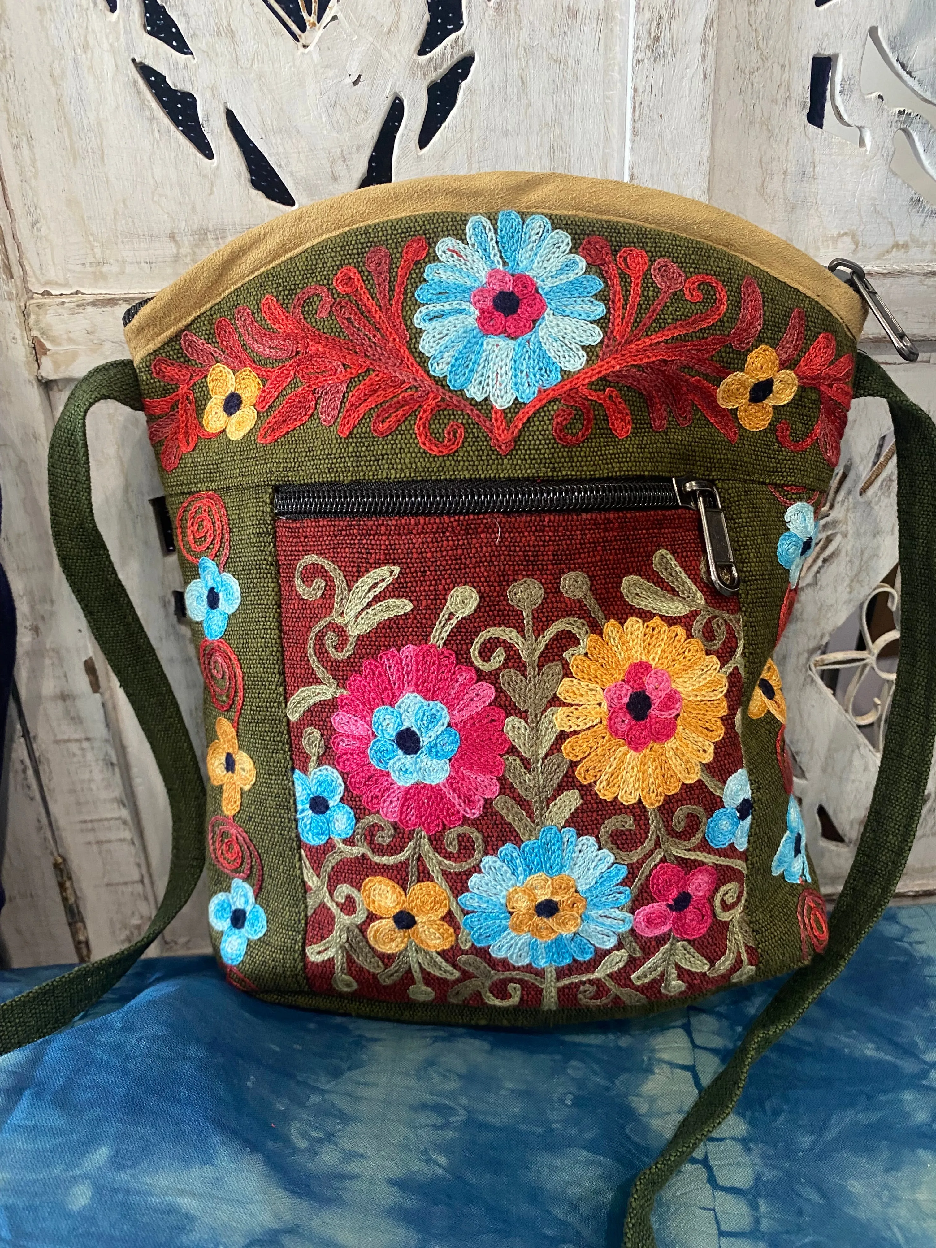 LWH Embroided Round Top Flower Handbag with shoulder strap.